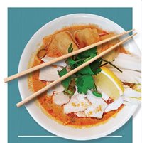 Top down photo of a rice noodle laska dish